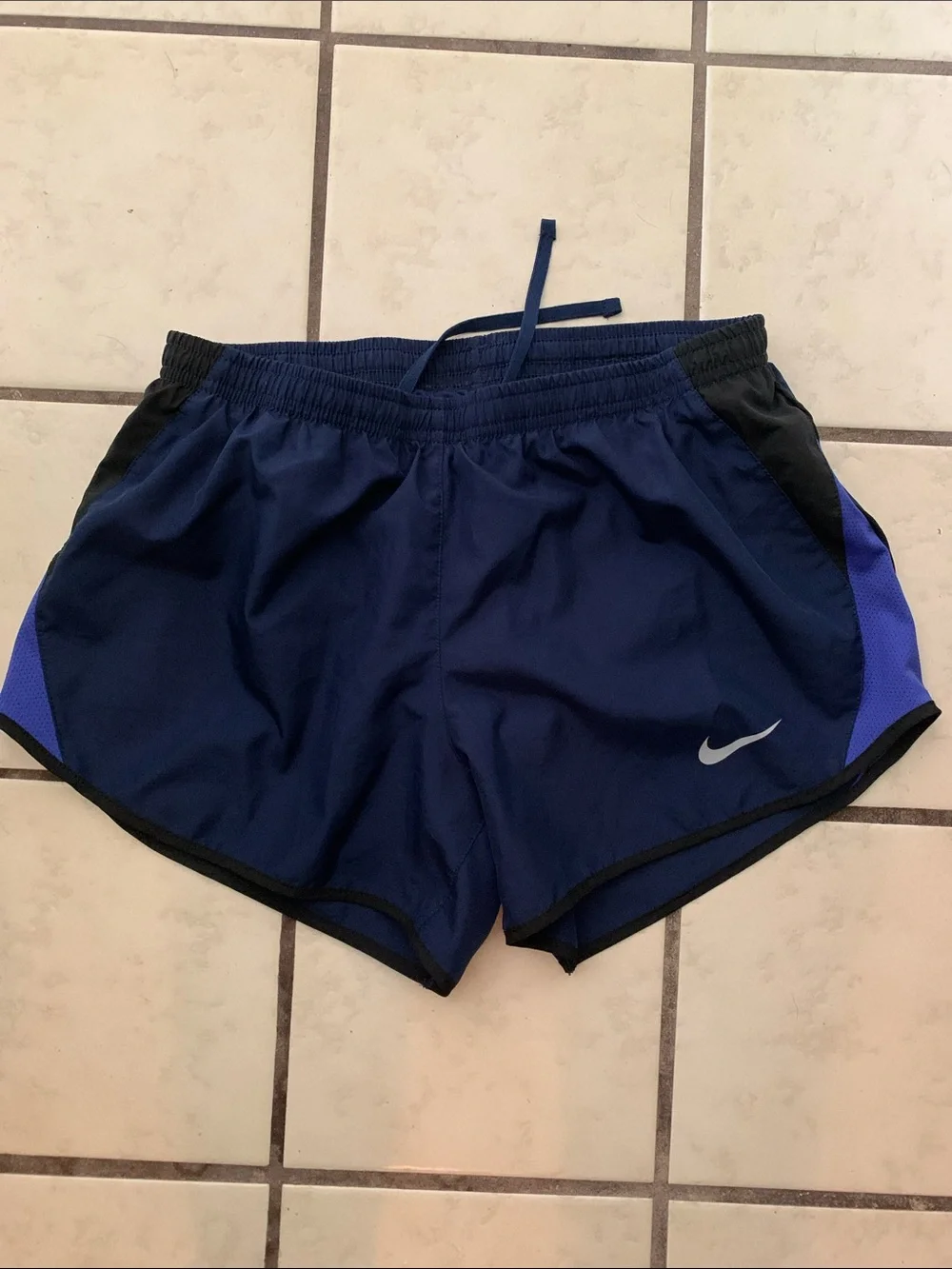 Nike Women's Dark Blue Athletic Shorts with Black Trim and Purple Panels